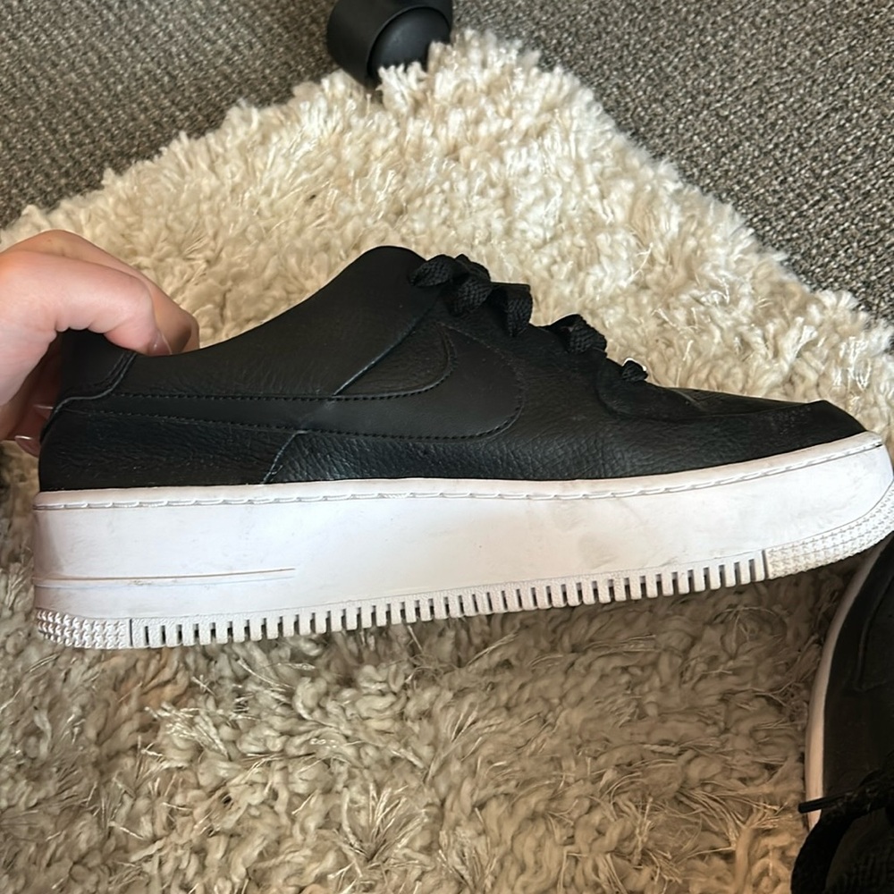 Black platform Nike shoes